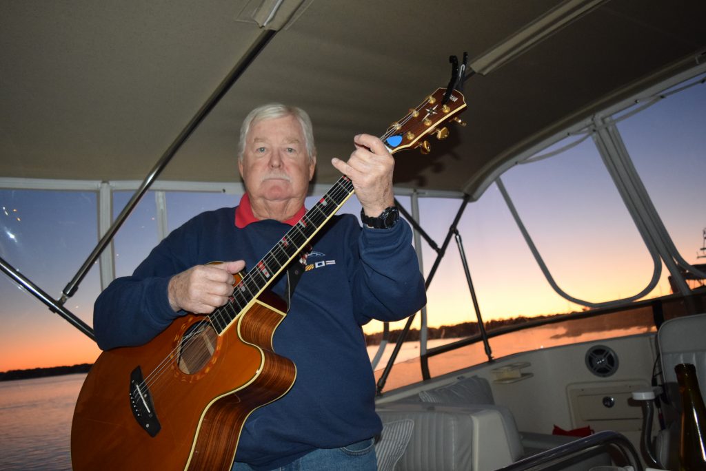 Bruce and his guitar aboard Scout