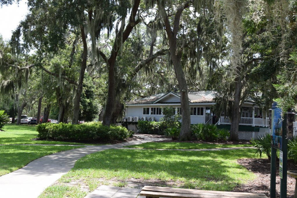 On-site Riverhouse Restaurant under the trees